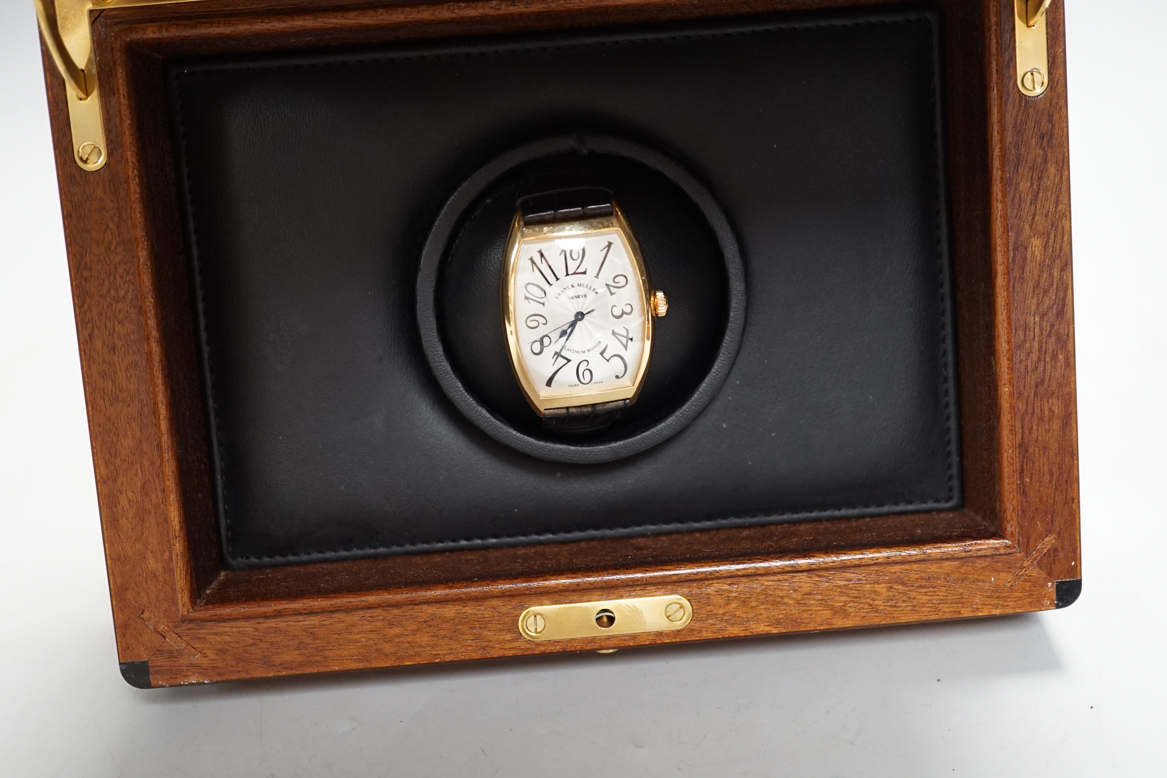 A gentleman's 2005 Swiss 18kt Franck Muller automatic platinum rotor wrist watch, with tumbling Arabic numerals, no.167, case no. 6850 SC, with box and papers, cased diameter 34mm, on a leather strap with 750 clasp.